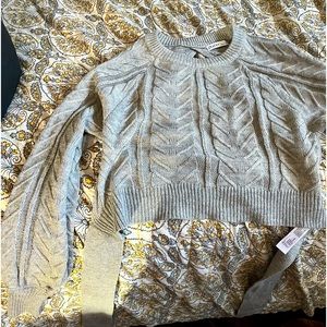 Gray knitted sweater with open back. Size large fits like M/L